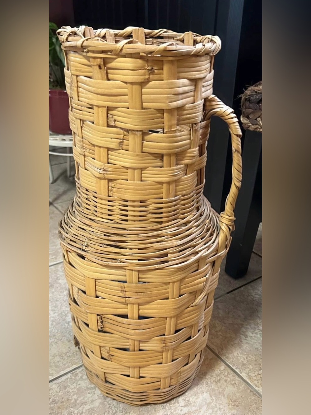 Vintage Rattan boho wicker floor vase. Approximately 22 inches tall